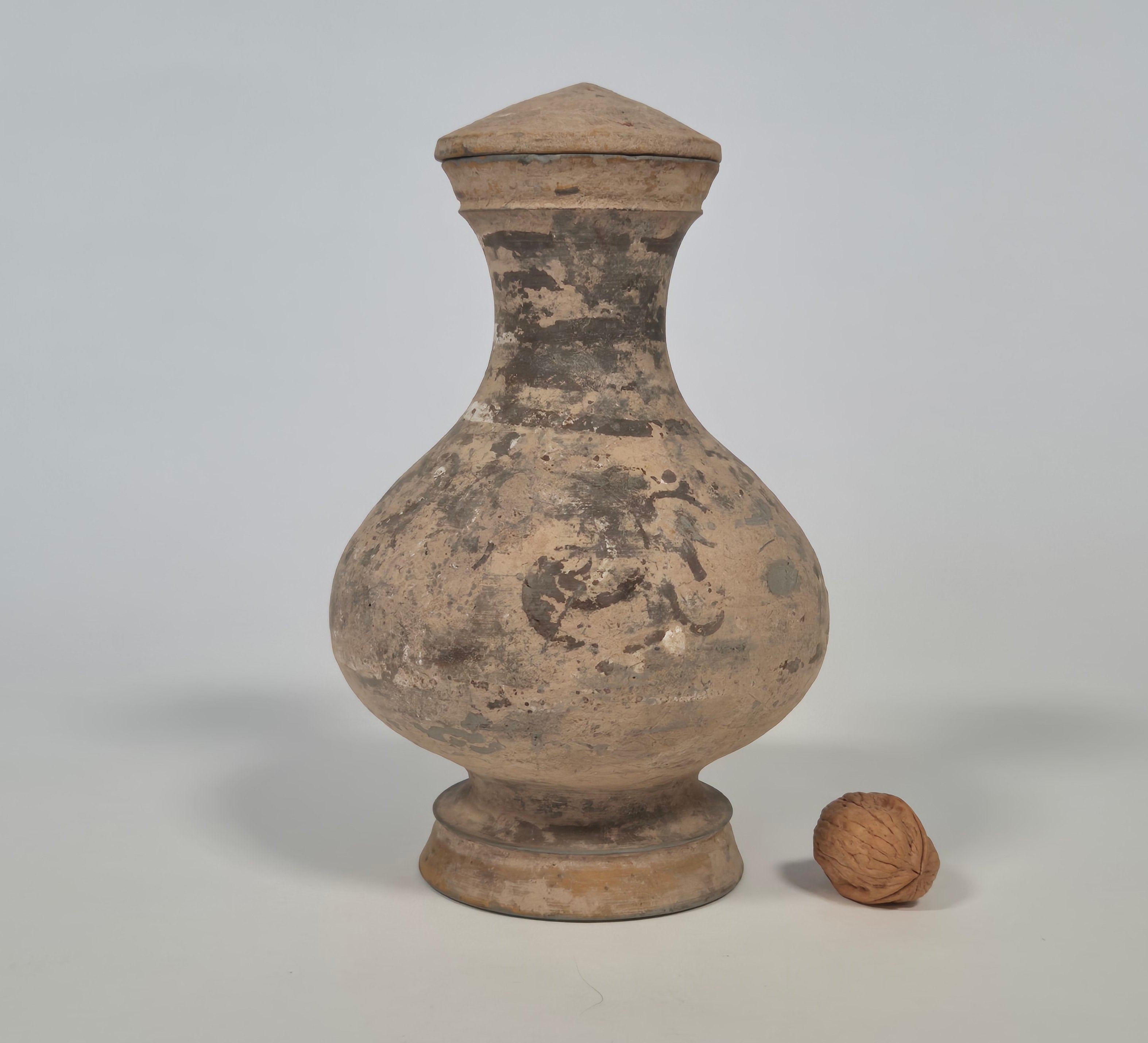 A lidded pottery Hu jar with traces of painting – Western Han